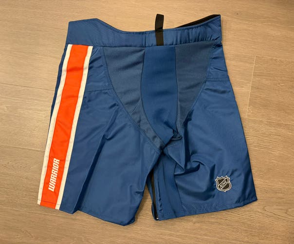 Warrior Covert QRE Pro Girdle/Pants shell Medium +1 Navy/Orange - New York Islanders Pro Stock (New)