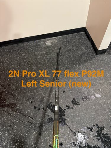 Nexus 2N Pro XL Left P92M 77 Flex dressed as blackout tracer Bauer hockey stick