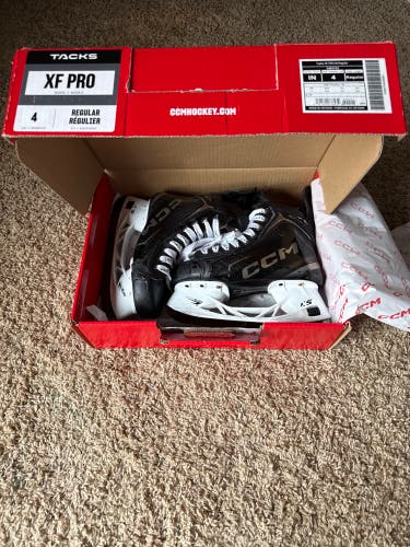 Black/White 2024 CCM Tacks XF Pro Hockey Skates Regular Width Size 4 (Used)