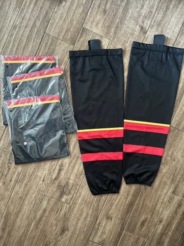 Black Senior Large Socks (New) Vancouver Canucks Alternate Red Yellow Black w Velcro