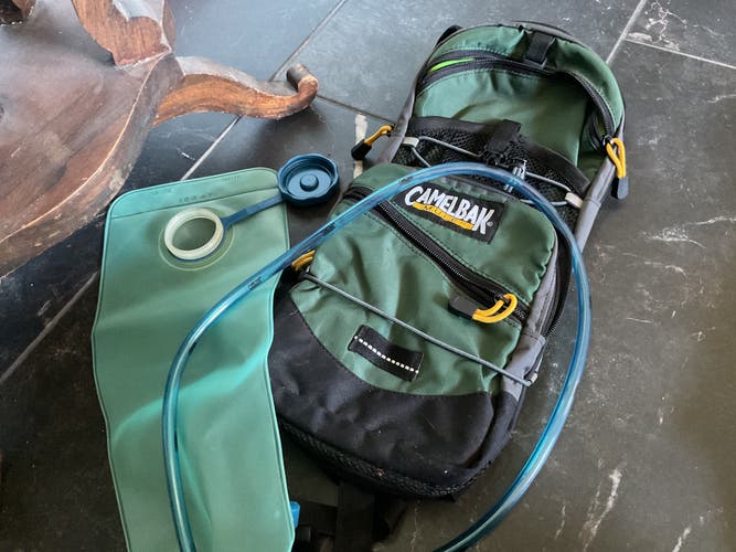 Green and black  Mule camelbak 100oz (Used)