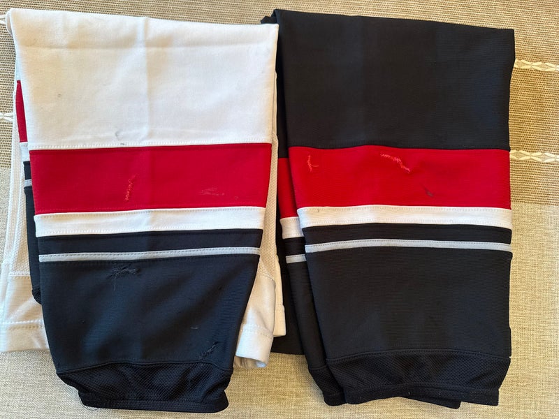 Black/Red/Gray AHL Home and Away Pro Stock Reebok Edge Socks (Used)