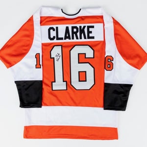 Bobby Clarke Autographed Philadelphia Flyers Captain's Jersey & Sher-Wood Alumni Stick Authentic Vin