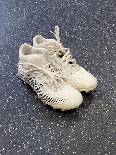 Used New Balance FREEZE LAX Cleats Boys White Junior 04.5 11849-S000037536