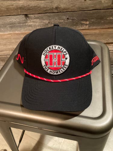 G-SW Hockey Helps the Homeless golfer cap