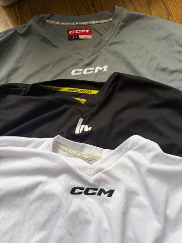 Three Large Men's Practice Jerseys (Used)