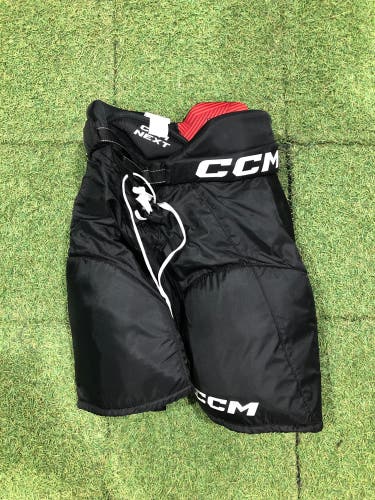 Black Junior Medium CCM Next Hockey Pants (Used)