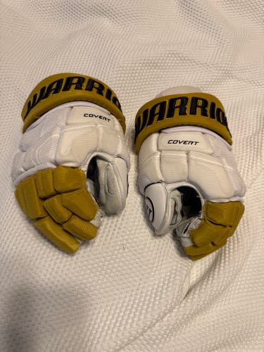 Warrior Covert QRE Pro Gloves 14" Pro Stock (Used) White Gold Black. Golden Knights NHL