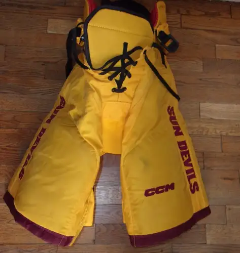 ARIZONA STATE hockey game-worn gold #61 CCM pants worn by forward Lukas Sillinger