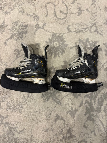 Black/Yellow 2022 Bauer Supreme M5 Pro Hockey Skates Regular Width 8.5 (Used)