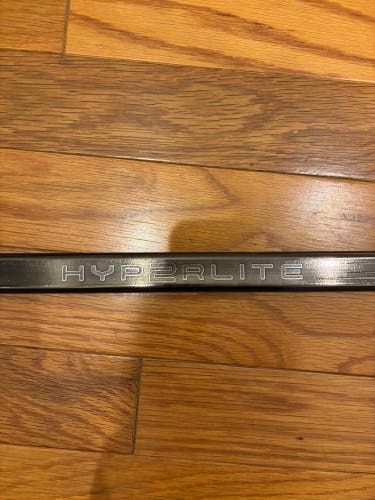 All black pro stock Senior Bauer Vapor Hyperlite 2 Left Hand Hockey Stick P28 77 Flex  (New)