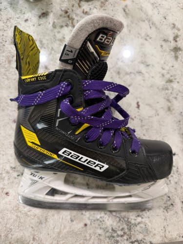 Black/Yellow 2022 Bauer Supreme M4 Hockey Skates Regular Width Size 1.5 (Used)