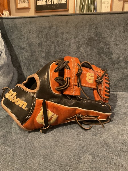 Wilson A2000 Infield Baseball Glove 11.75. Fully broke in. Black/Tan. Very Good Condition