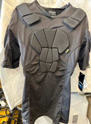 Bauer protective/padded shirt. New with tags.