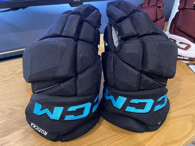 Black and Teal CCM HGJSPP (Jetspeed FT1) Gloves 14" Pro Stock - Like New (Used)
