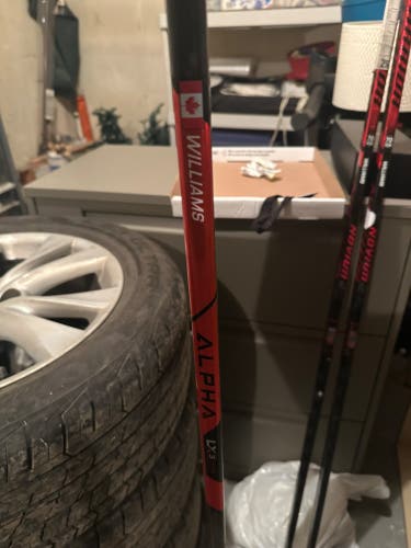 Intermediate Warrior Novium 2 Pro Left Hand Hockey Stick P92 65 Flex Pro Stock (Used)