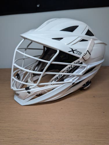 White Cascade XRS Pro Helmet with quick clip chinstrap (Used)