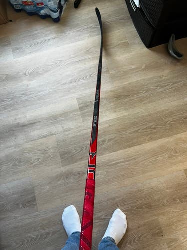 Signed Detroit red wings Lucas Raymond stick.