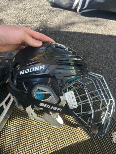 Small Bauer Re-Akt 65 Helmet with oreo cage