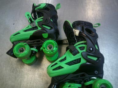 Used RollerDerby ADJ 12-2 Child Roller Quad Skates Black Youth 12.0 11339-S000200806