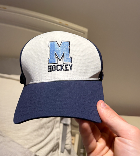 Saint Michaels college school ( SMCS ) team issued hockey hat
