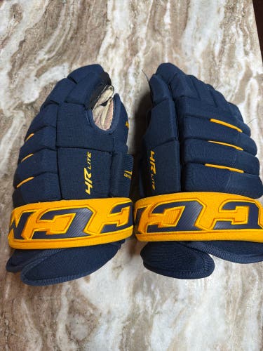 CCM Tacks 4 Roll Lite Gloves 14" Navy Blue And Yellow (Moderately Used)