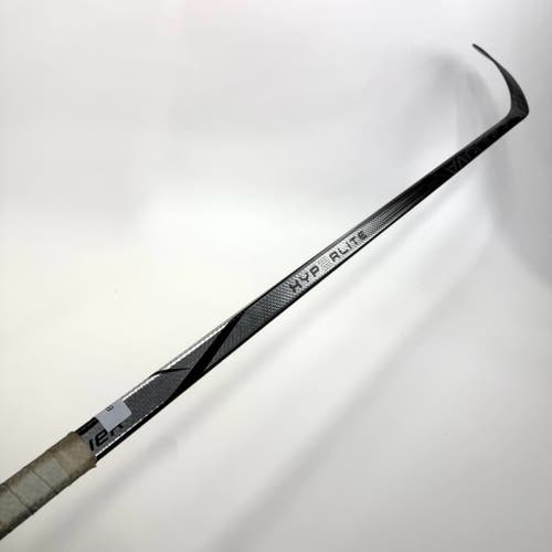 Used Right Silver Bauer Vapor Hyperlite 2 | 77 Flex P92 Curve Grip | BH502