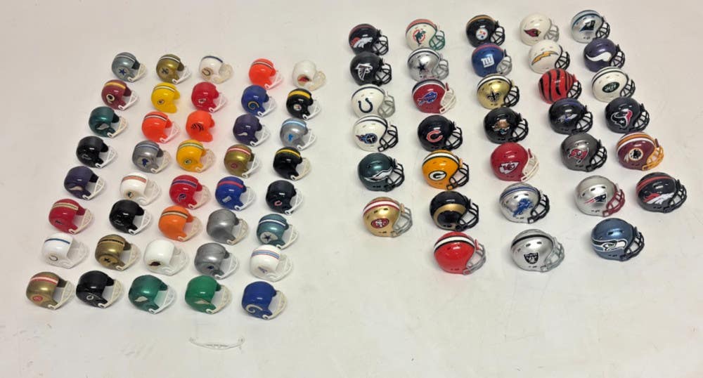 collectible miniature nfl football helmets Mini Helmet Shells (Speed Chrome Colors) Dallas Cowboys Speed Mini Helmet The Speed Mini Helmet is a half scale replica of one of the most popular new helmet introductions in Riddells history Riddell Pro Football Hall Of