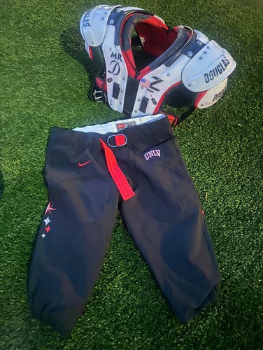 Adult Medium Douglas CP Mr DZ          Shoulder Pads (Used) with size XL UNLV football pant included