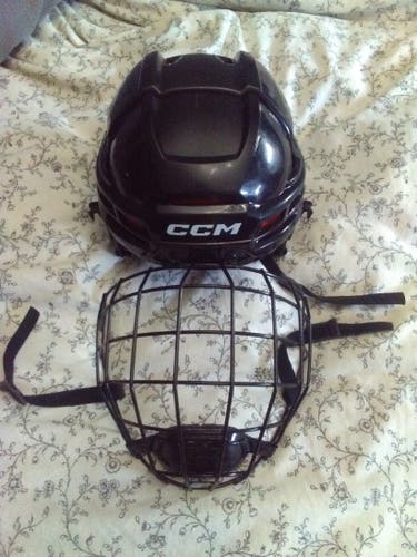Medium CCM Tacks 70 Helmet with cage ( barely used)
