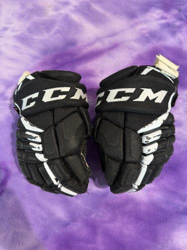 Black Junior CCM JetSpeed FT4 Gloves 11" (Used)