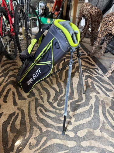 Top Flite junior golf stand bag features a black and volt green