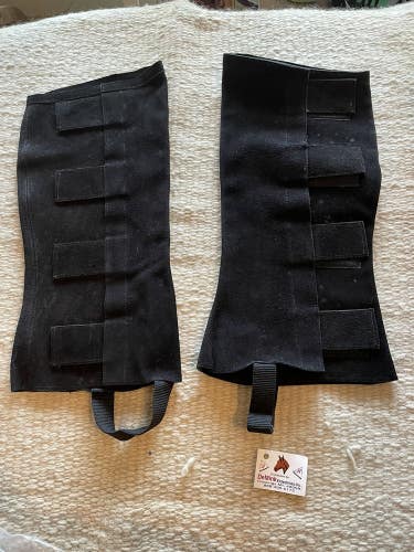 black suede half chaps size XL with hook and loop closures
