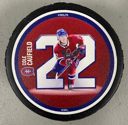 Cole Caulfield puck