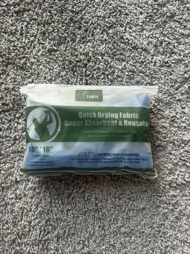 Golf towel / ball marker never opened
