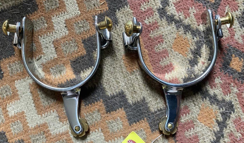 Ladies  stainless horizontal rowel Western spurs w/inward curved shank