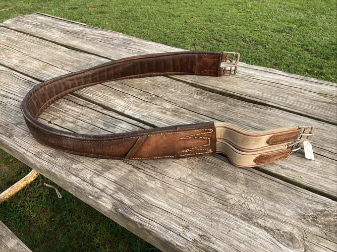 Used 52” padded/shaped  brown leather English girth w/keepers