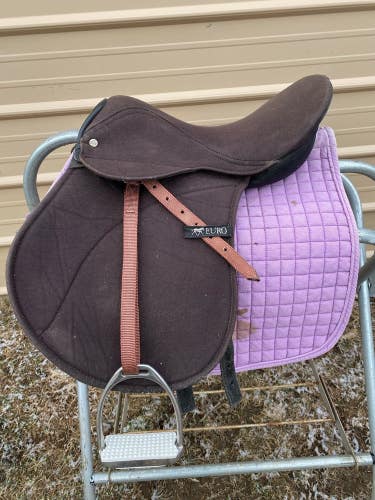 Used 15" child's brown Synthetic EURC AP English saddle w/fittings, pad UK made