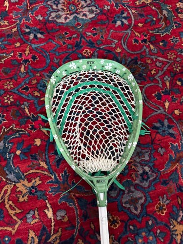 A green eclipse 3 head and a carbon pro 3 white goalie head