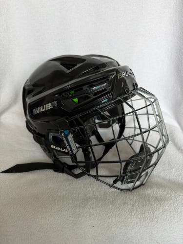 Bauer RE-AKT 155 Hockey Helmet Black Size senior small. With cage. Excellent Condition