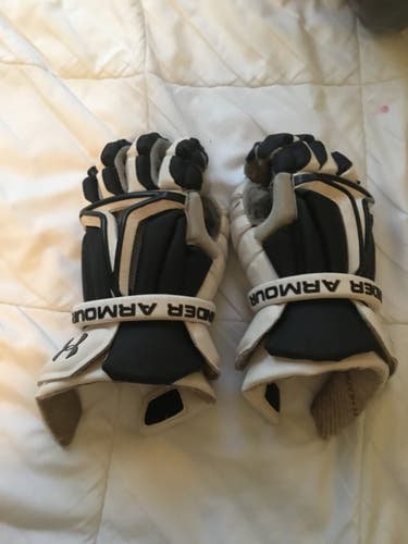 Medium lacrosse under Armour gloves