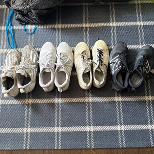 All 4 Used pair of Cleats, New balance and Adidas. New balance - 10.5, Adidas -11