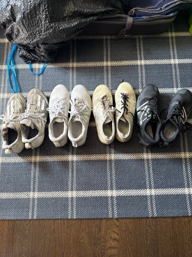 All 4 Used pair of Cleats, New balance and Adidas. New balance - 10.5, Adidas -11