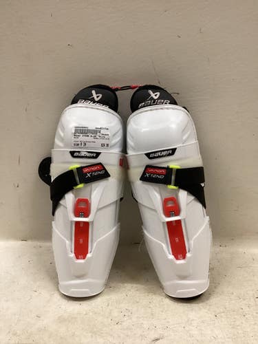 Used Bauer XTEND 8-10 Youth Shin Guards White/Black/Red 9" 11725-S000499863