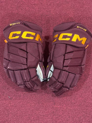 Minnesota gold practice jersey & CCM JetSpeed FT1 Gloves 14" Pro Stock Item#MNGNC