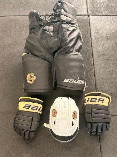 Pro stock USHL Muskegon Lumberjacks pants gloves and helmet
