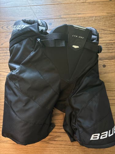 Black Junior Medium Bauer Vapor LTX pro Hockey Pants (Used)