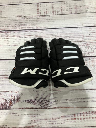 Black Junior CCM Tacks 4 Roll Pro 2 Gloves 12" (Used)