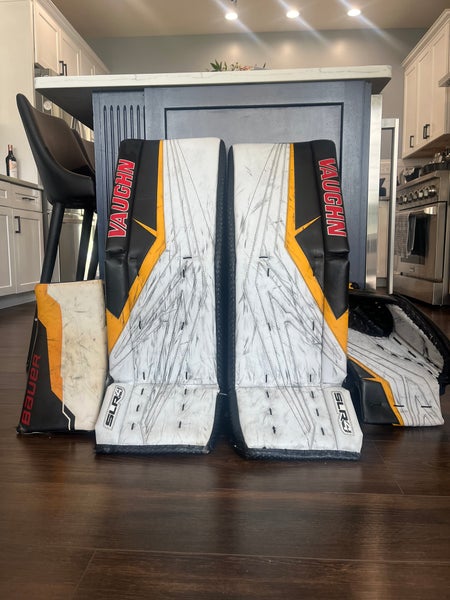 33 + 1.5” Vaughn SLR4 Pro Carbon Regular Goalie pads and glove with Bauer blocker.