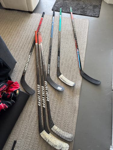 Bauer Left Hand Hockey Sticks P92 65 and 70 Flex. all are in decent condition some good.  (Used